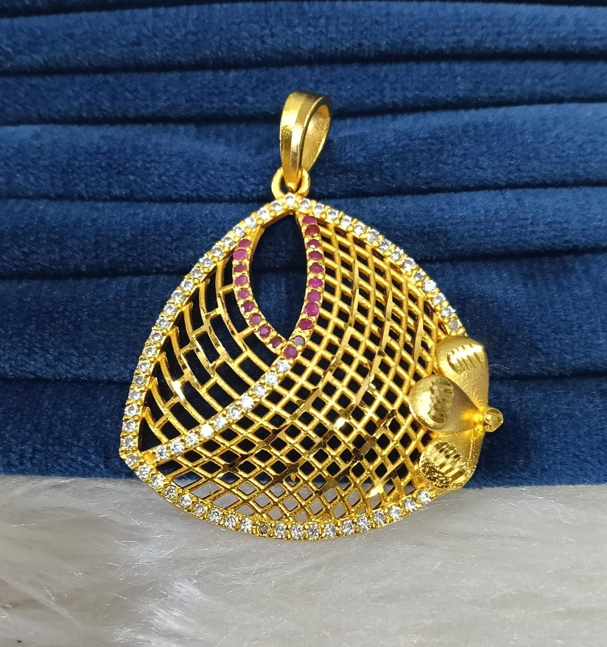 Gold plated AD pendant.