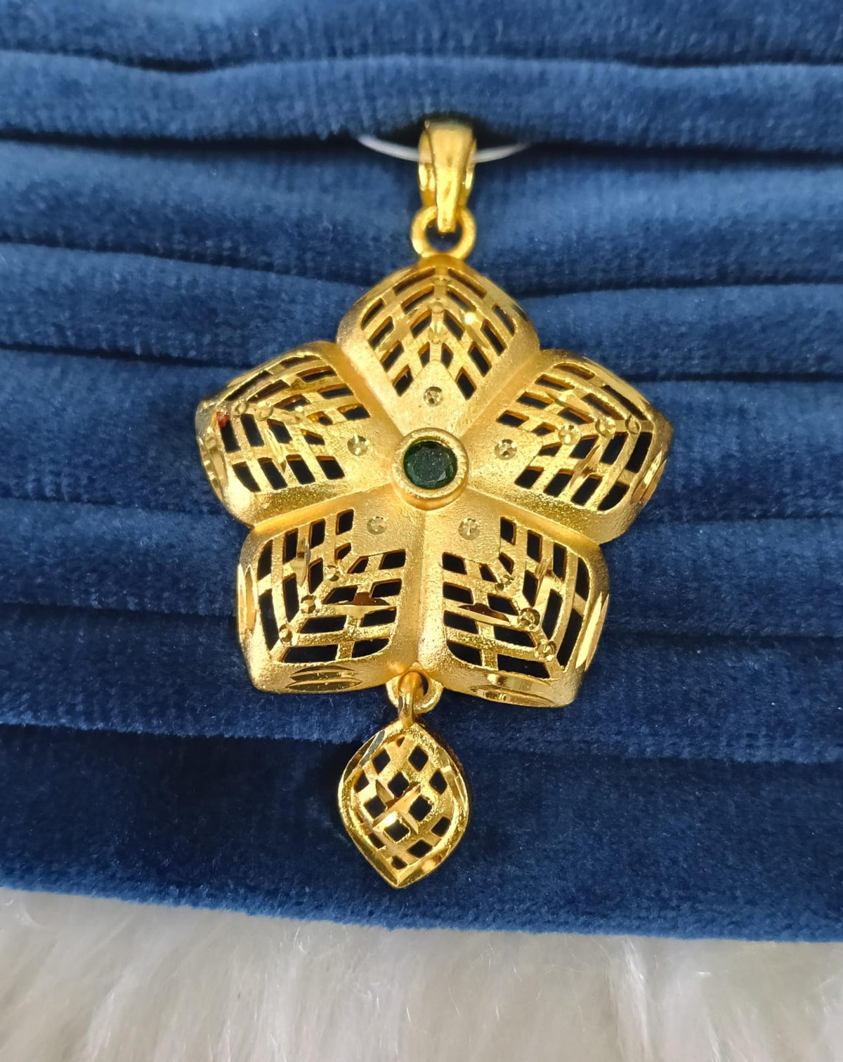 Gold plated pendant.