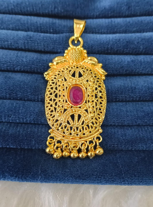 Gold plated pendant.
