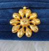 Gold plated pendant.