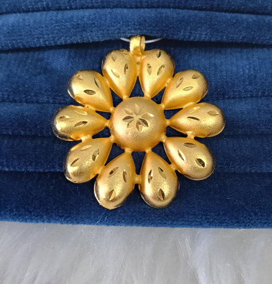 Gold plated pendant.