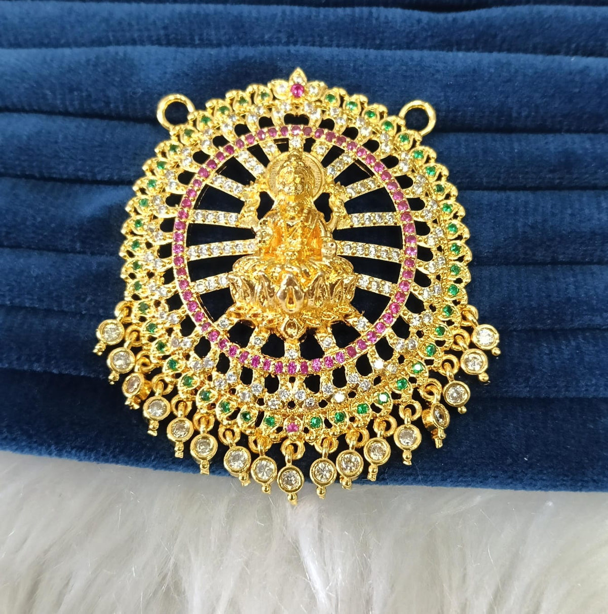 Gold plated AD pendant.