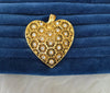 Gold plated pendant.