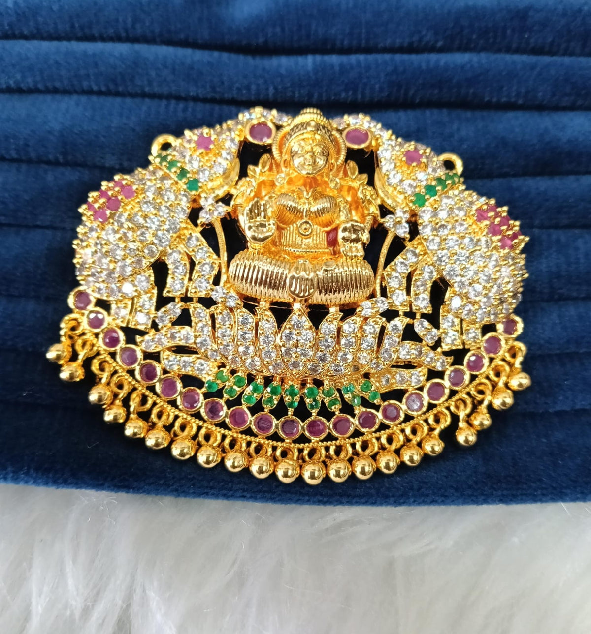 Gold plated AD pendant.