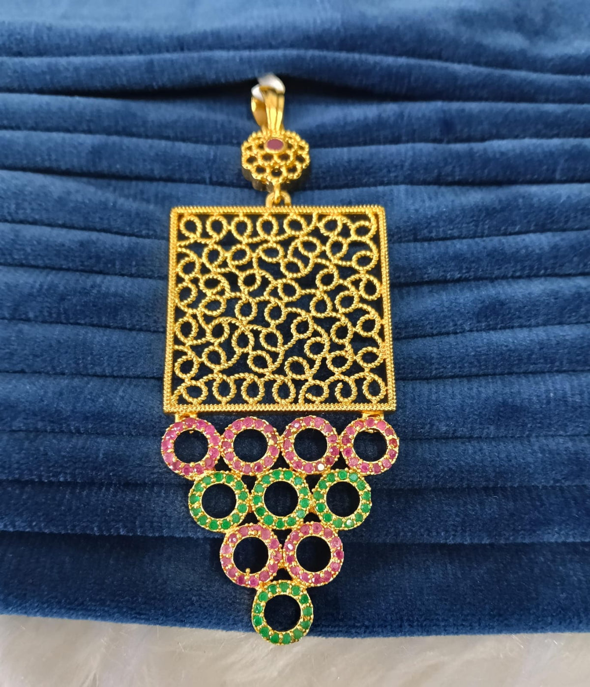 Gold plated pendant.
