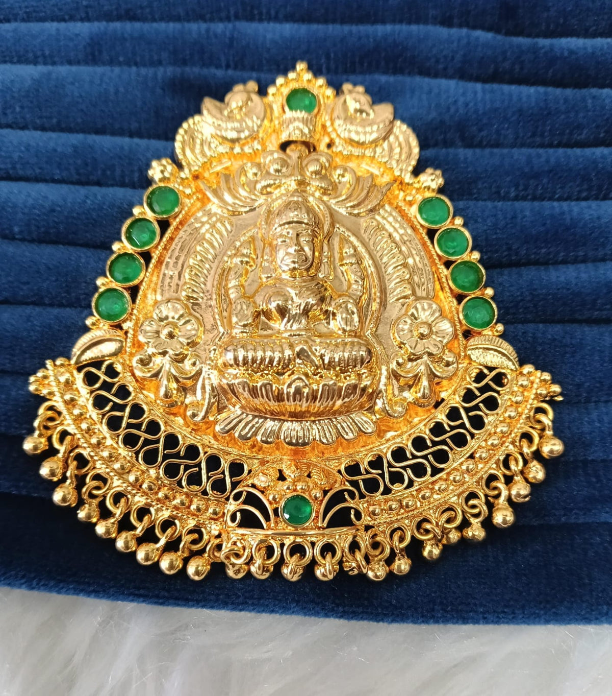 Gold plated pendant.