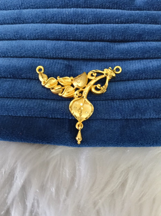 Gold plated pendant.
