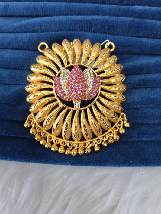 Gold plated pendant.