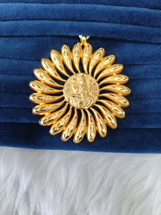 Gold plated pendant.