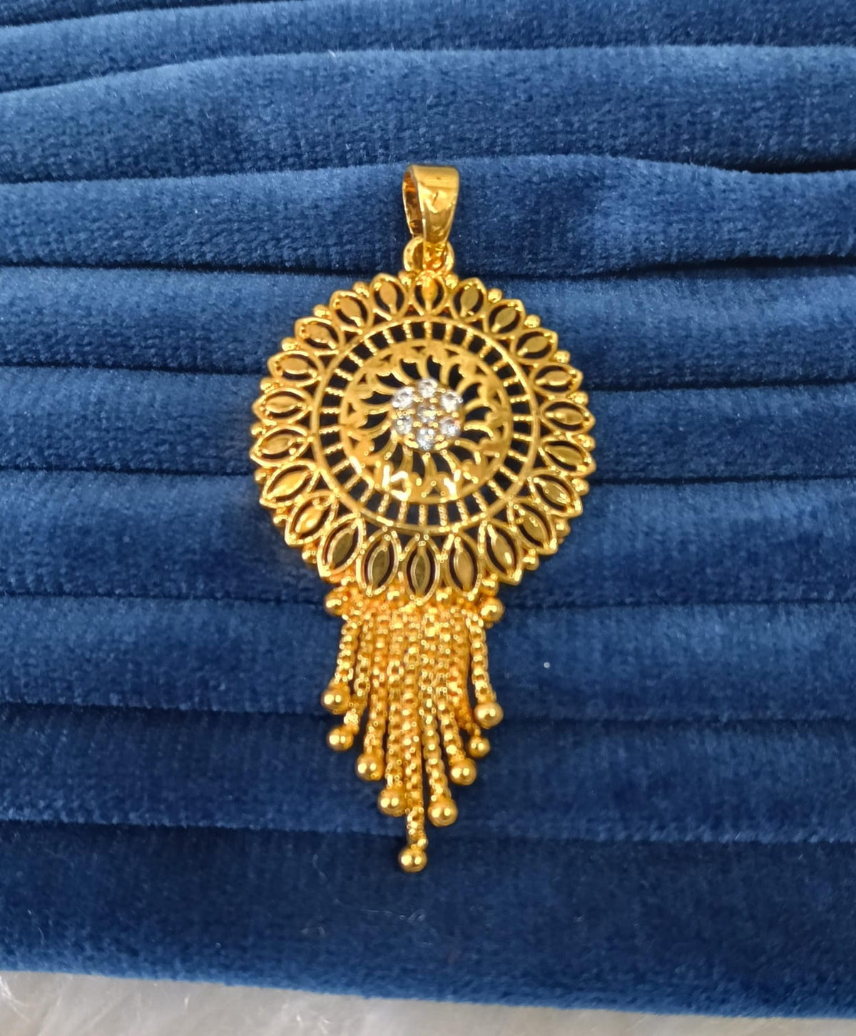 Gold plated pendant.