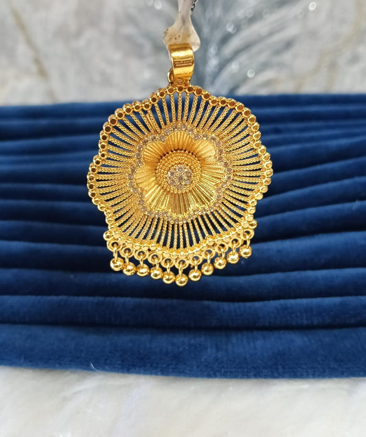 Gold plated pendant.