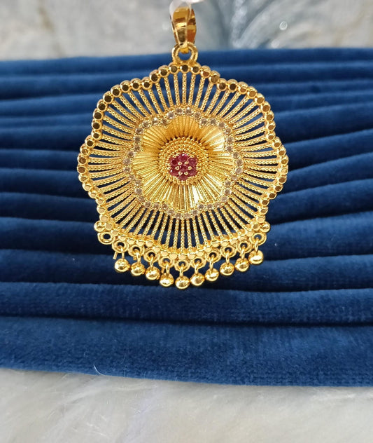 Gold plated pendant.