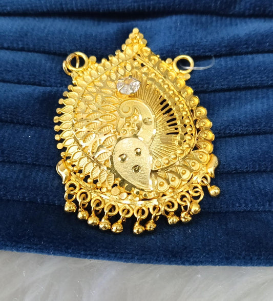 Gold plated pendant.