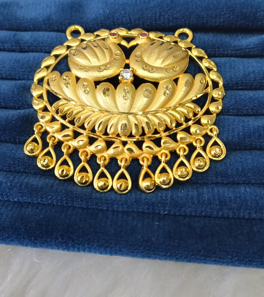 Gold plated pendant.