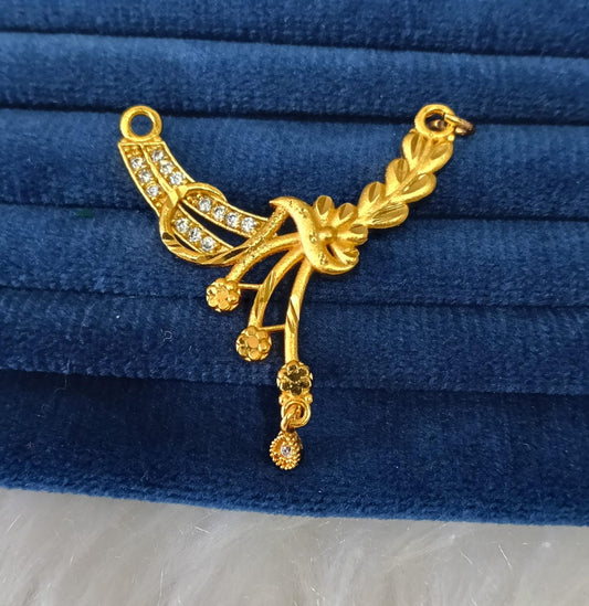 Gold plated pendant.