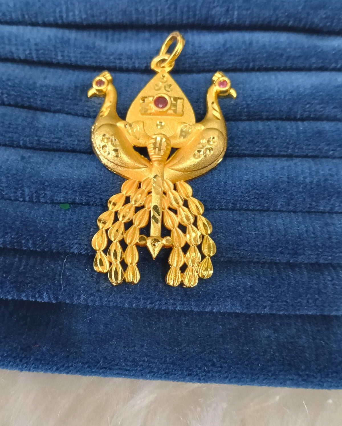 Gold plated pendant.