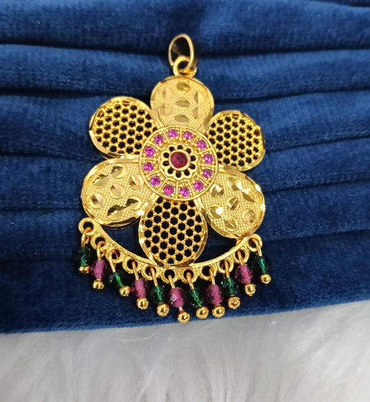 Gold plated pendant.