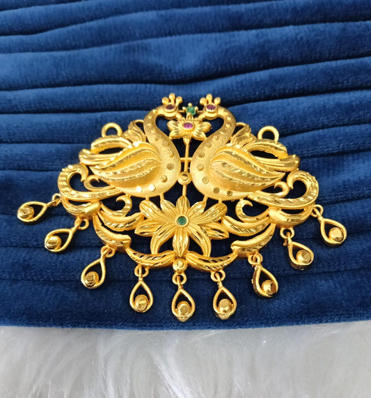 Gold plated pendant.