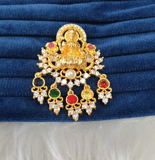 Gold plated pendant.