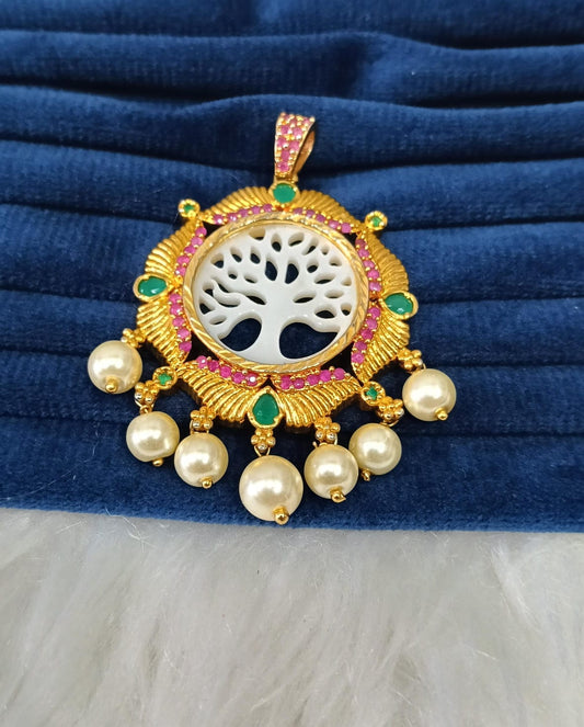 Gold plated pendant.