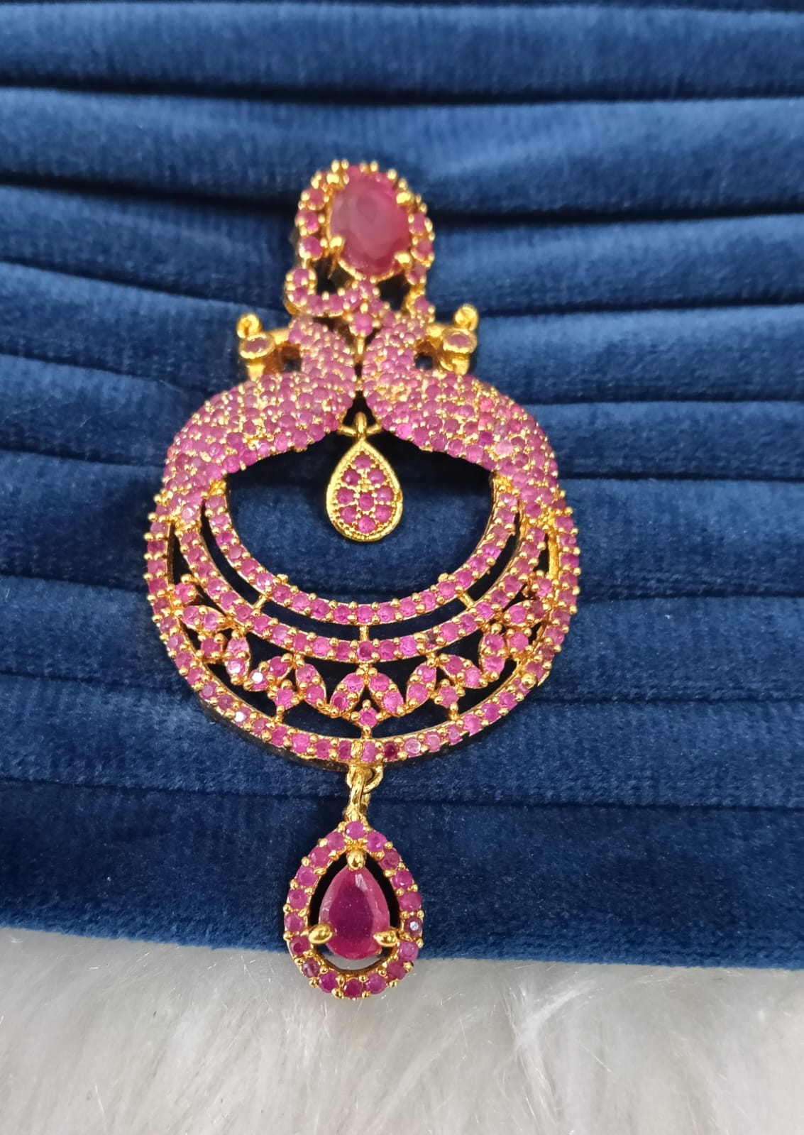 Gold plated AD pendant.