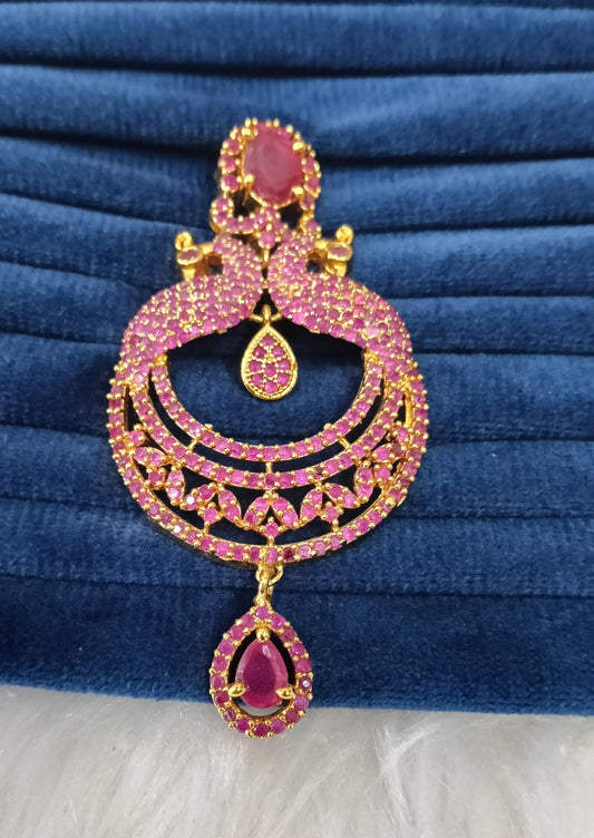 Gold plated AD pendant.