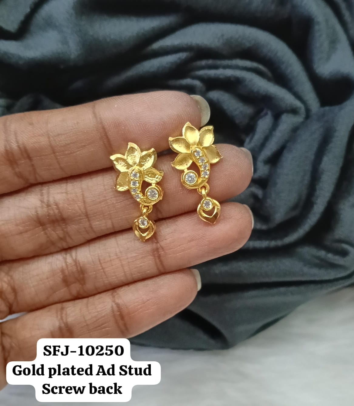 Gold plated stud.