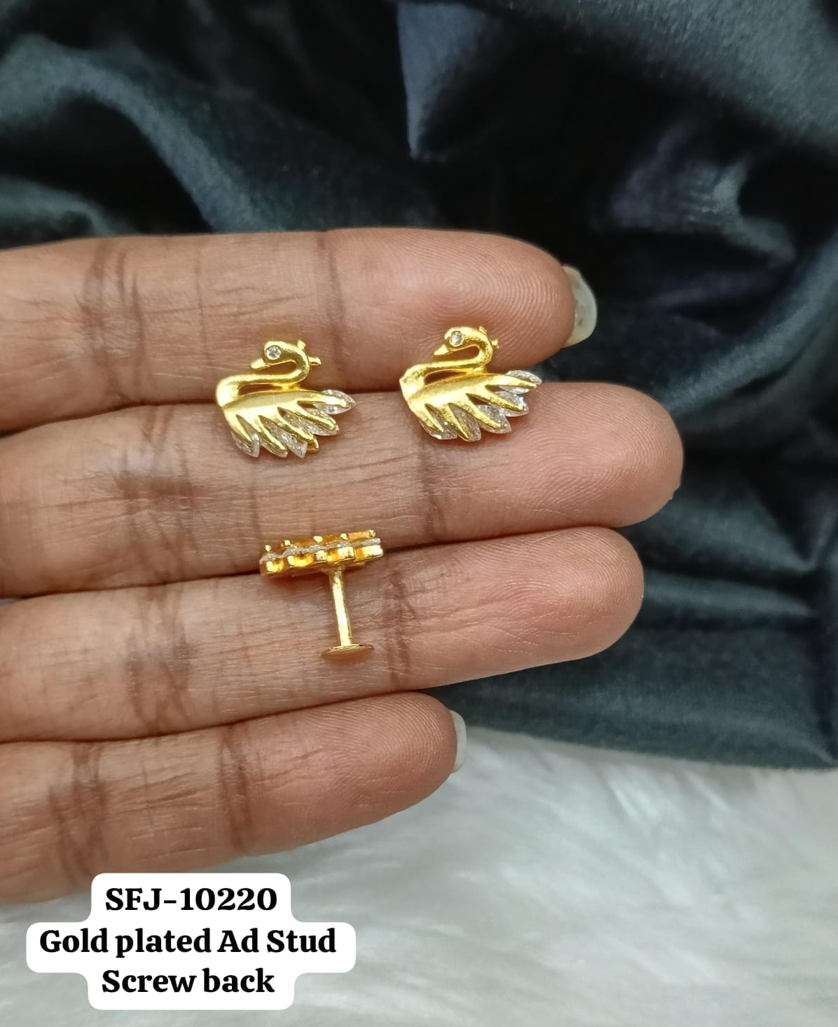 Gold plated studs.