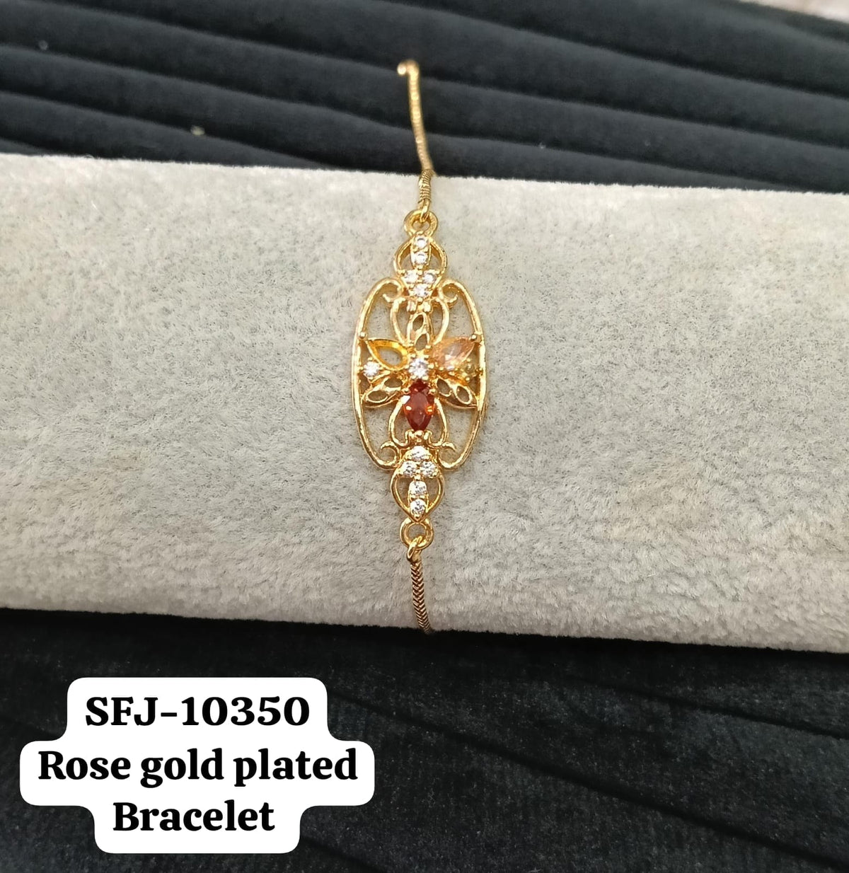 Gold plated AD bracelet.