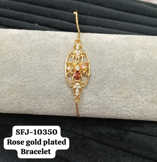 Gold plated AD bracelet.