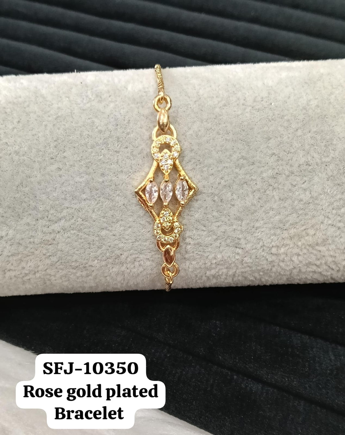 Gold plated AD bracelet.