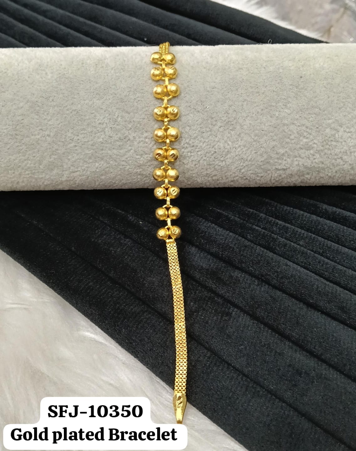 Gold plated bracelet.