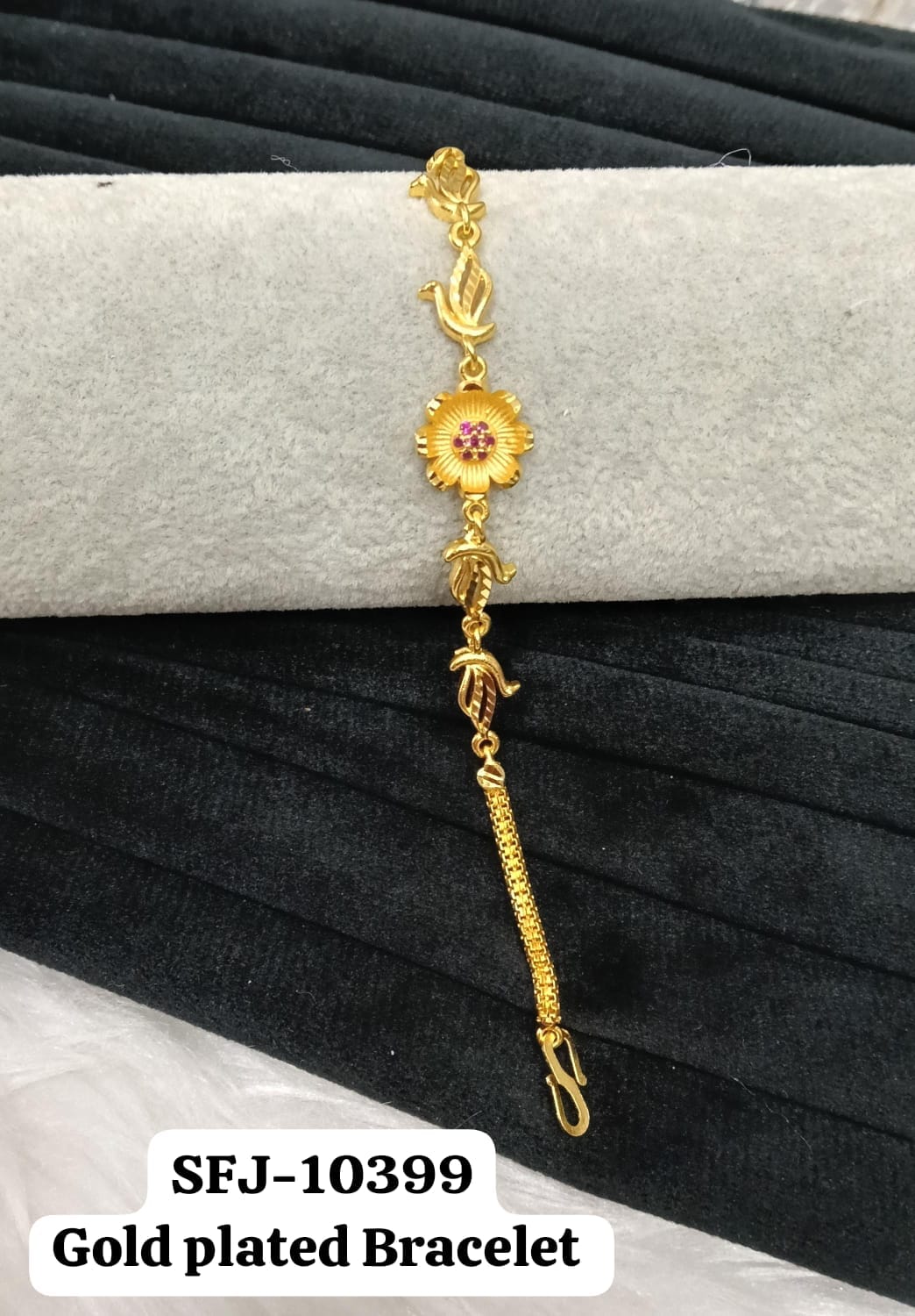 Gold plated bracelet.