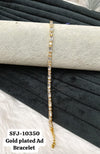 Gold plated AD bracelet.