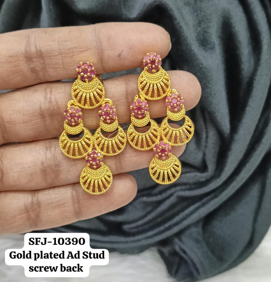Gold plated earing.
