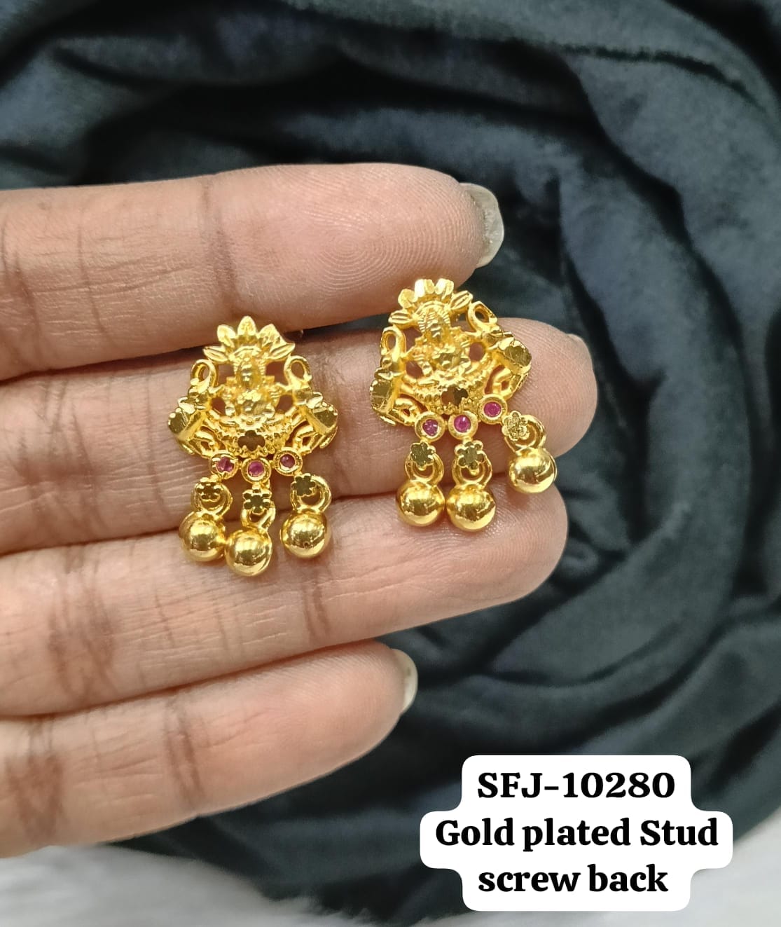 Gold plated stud.