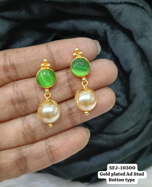 Gold plated earing.
