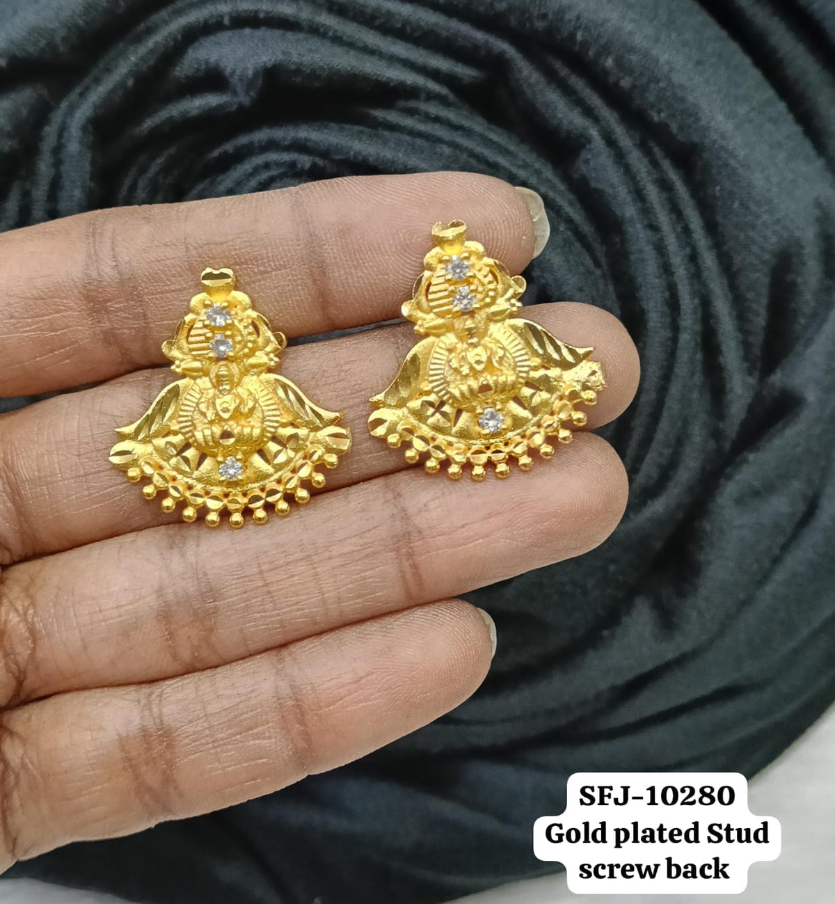 Gold plated earing.