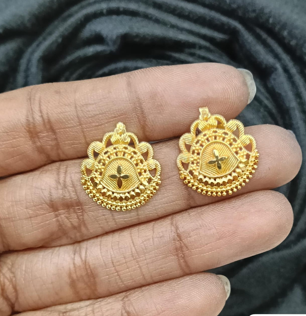 Gold plated stud.
