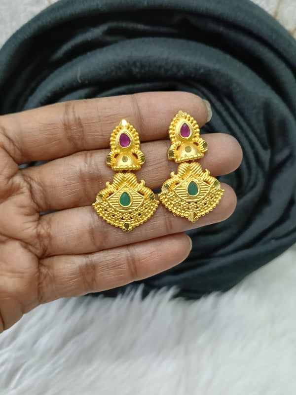 Gold plated earing.