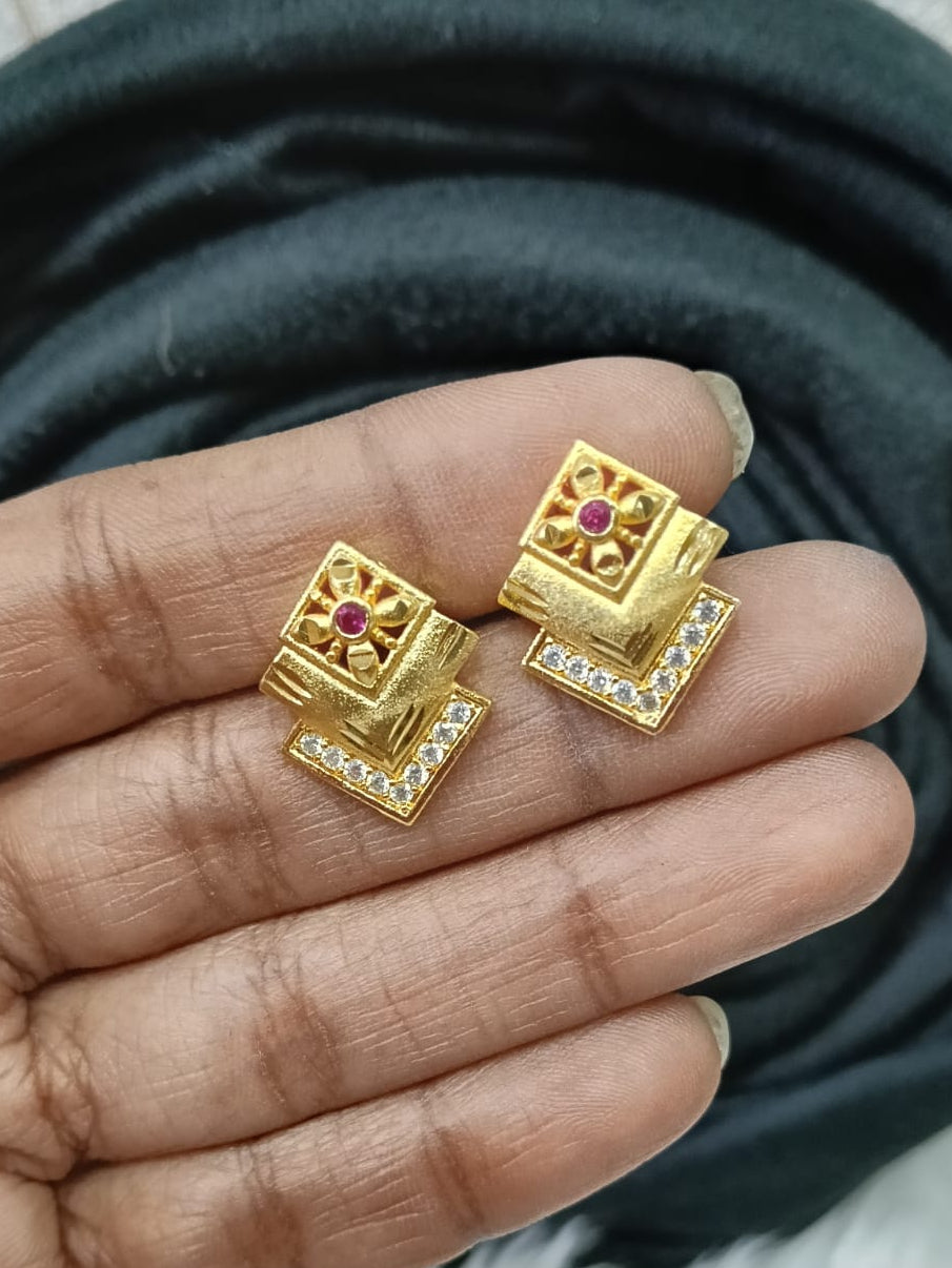 Gold plated stud.