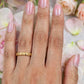 Gold plated adjustable ring.