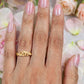 Gold plated adjustable ring.