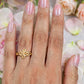 Gold plated adjustable ring.
