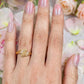 Gold plated adjustable ring.