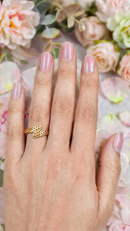 Gold plated adjustable ring.