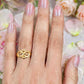 Gold plated adjustable ring.
