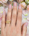 Gold plated adjustable ring.