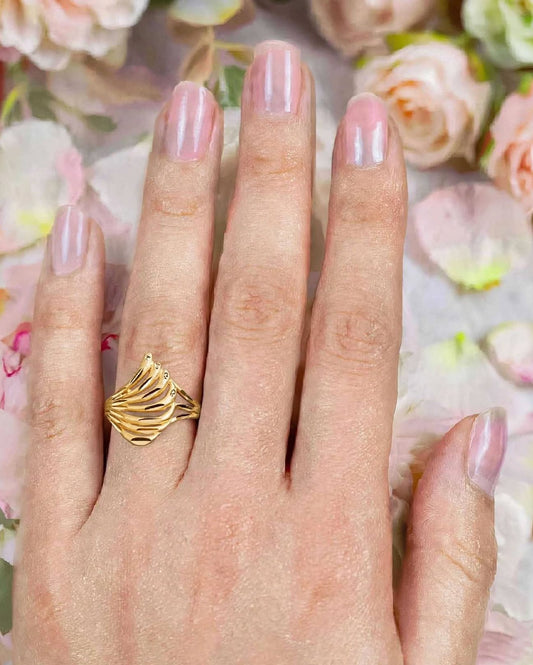 Gold plated adjustable ring.