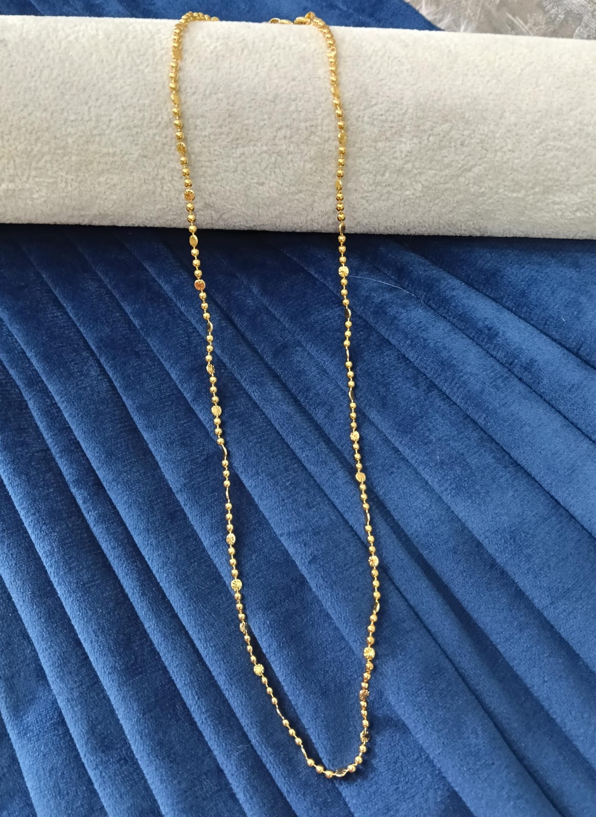 Gold plated chain.
